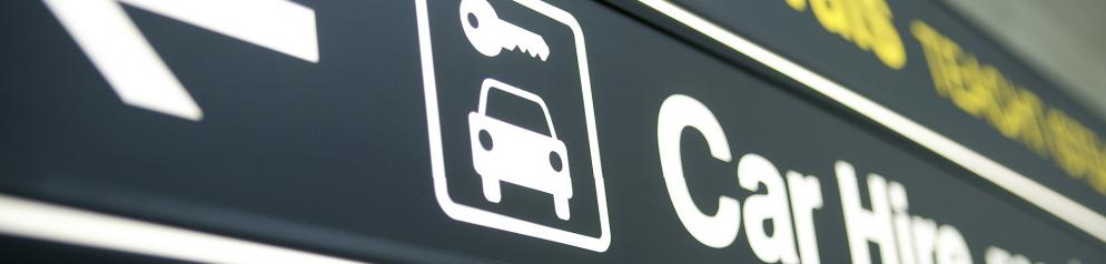 Mietwagen_ Abholstation Schild_schmal